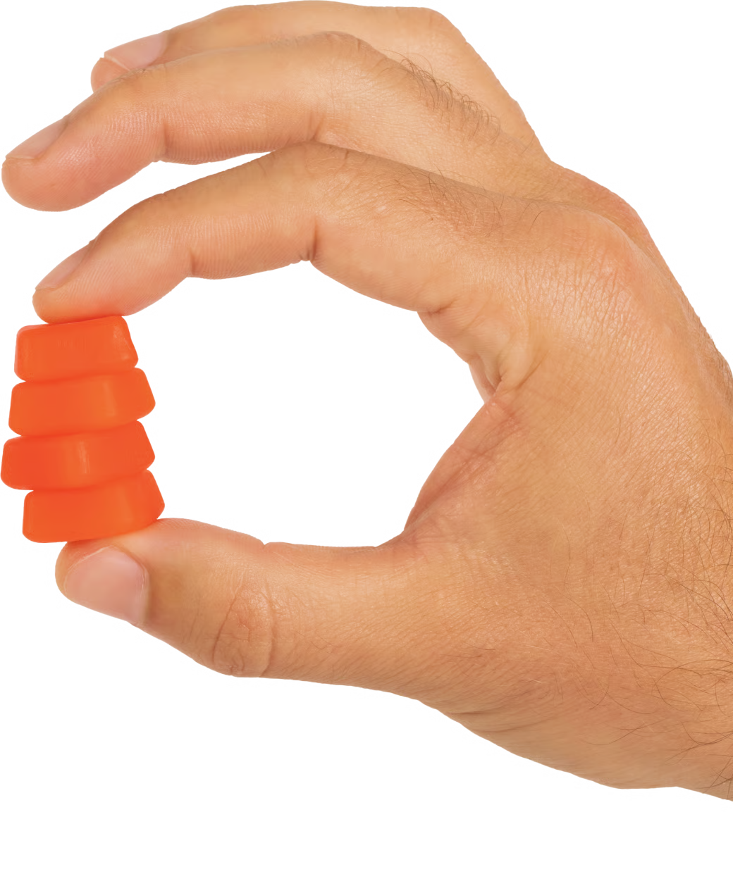 A hand holding four Peachy Plump gummies