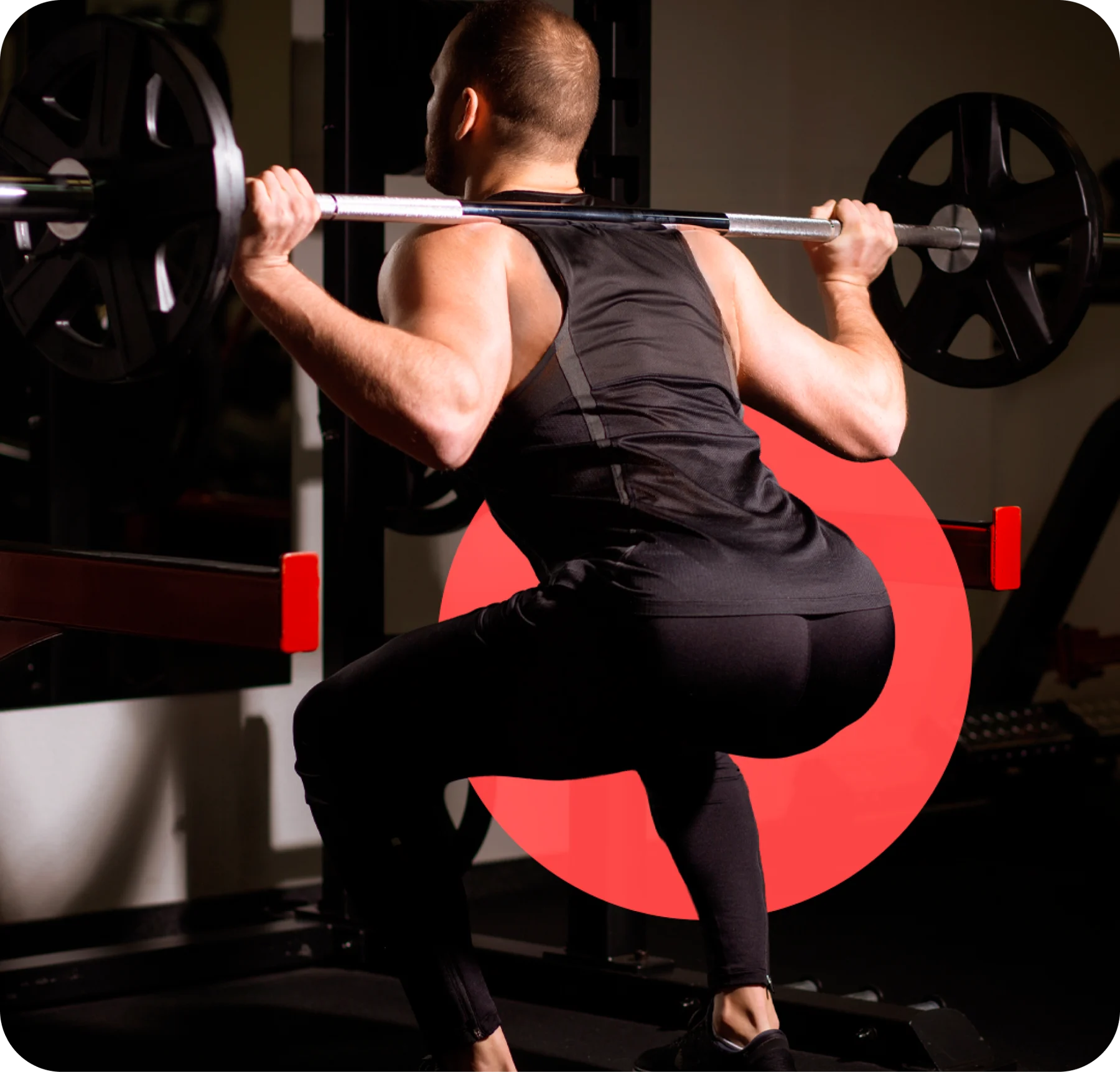 An athlete performing a weighted squat